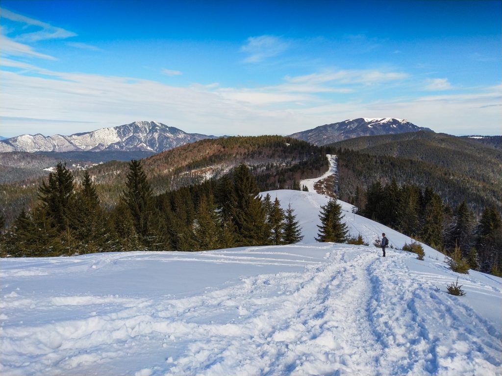 Winter hike in Romania - view over Postavaru and Piatra Mare moutains