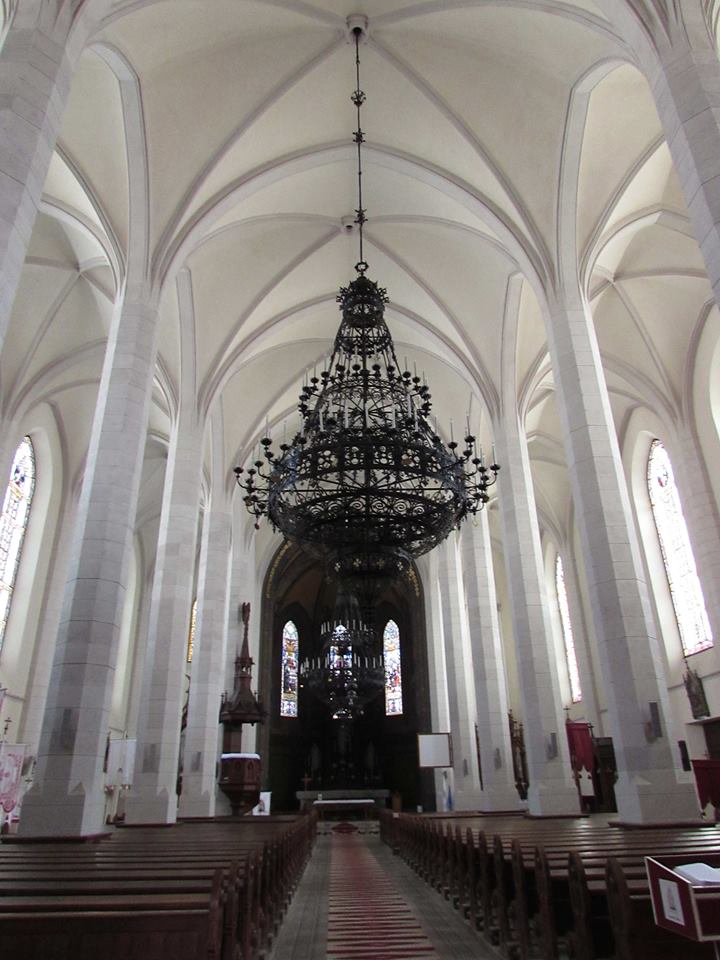 Church in Ditrau - chandelier and main hallway
